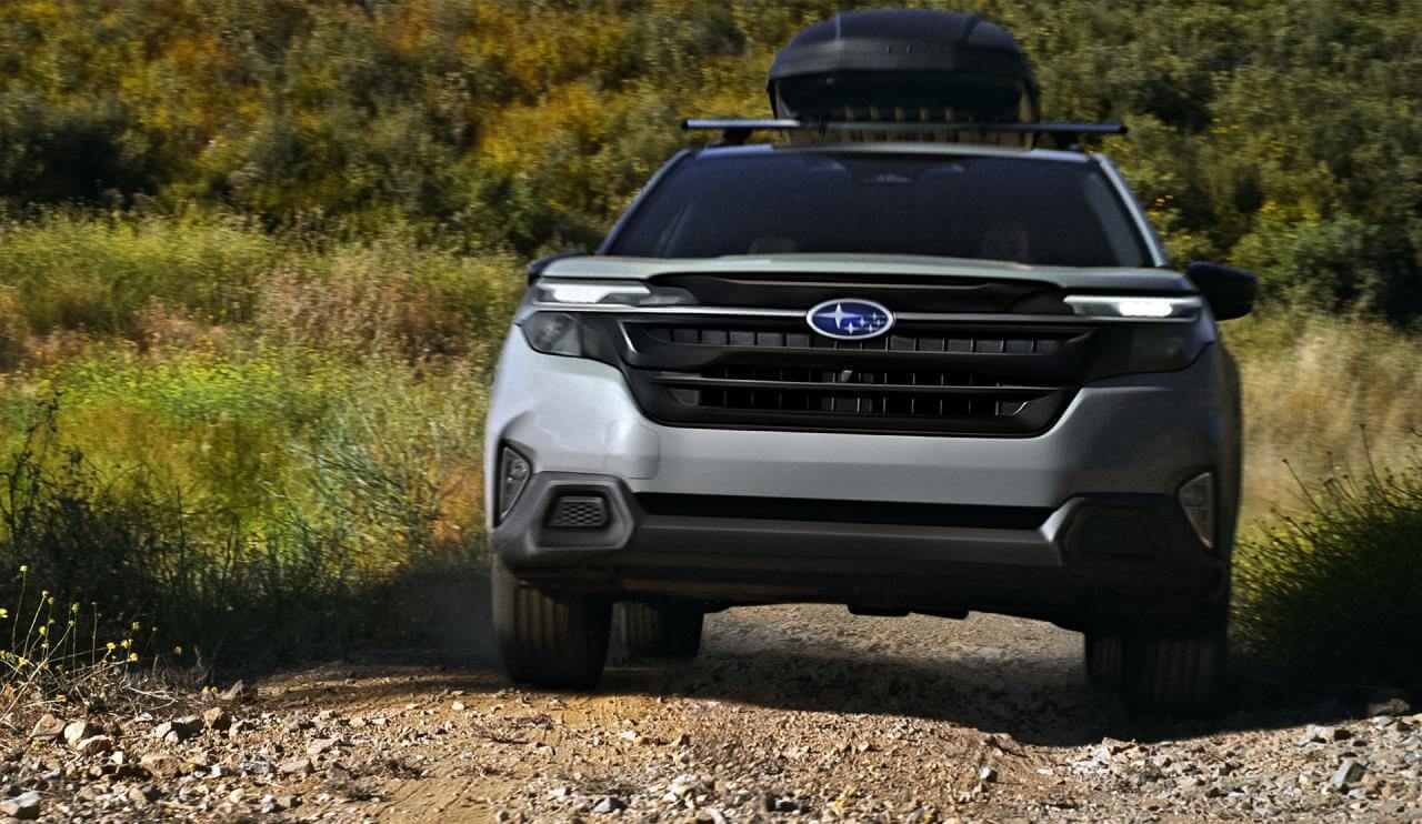 Front view of the 2025 Subaru Forester on a trail.