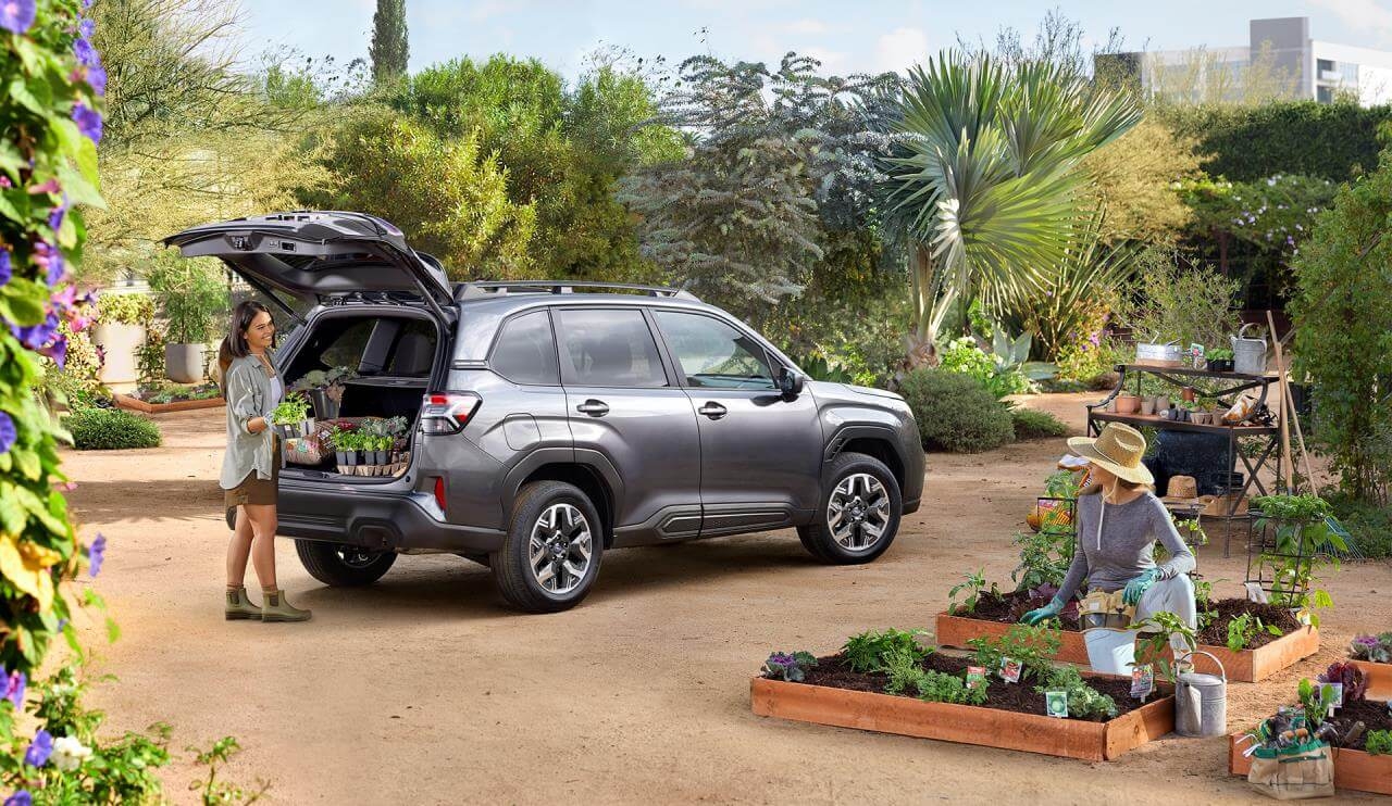 Ultra versatile cargo compartment of the 2025 Subaru Forester parked in a garden.